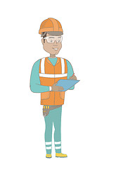 Image showing Young hispanic building inspector with clipboard.