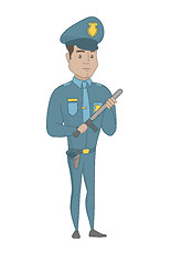 Image showing Young serious hispanic policeman with baton.