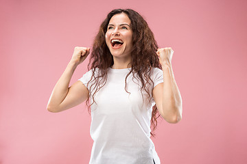 Image showing Winning success woman happy ecstatic celebrating being a winner. Dynamic energetic image of female model