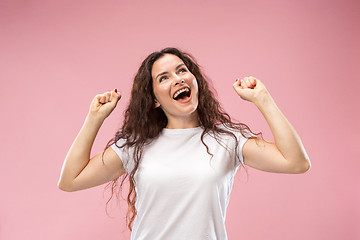 Image showing Winning success woman happy ecstatic celebrating being a winner. Dynamic energetic image of female model