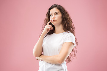 Image showing Young serious thoughtful business woman. Doubt concept.