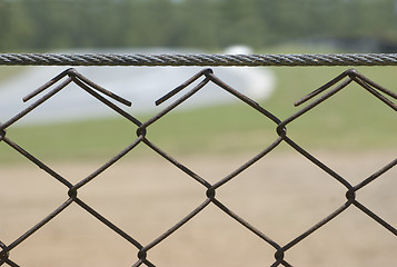 Image showing Detail of rusty wire fence