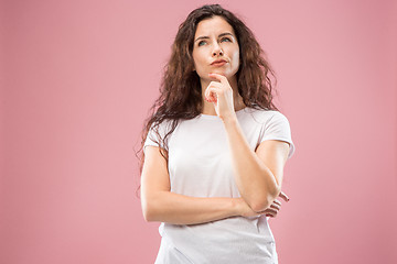 Image showing Young serious thoughtful business woman. Doubt concept.