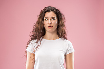 Image showing Beautiful woman in stress isolated on pink