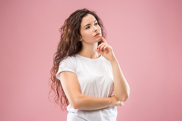 Image showing Young serious thoughtful business woman. Doubt concept.