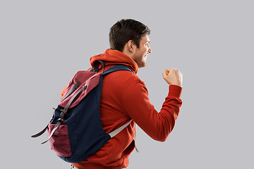 Image showing male tourist or student celebrating success