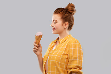 Image showing happy red haired teenage girl with ice cream cone