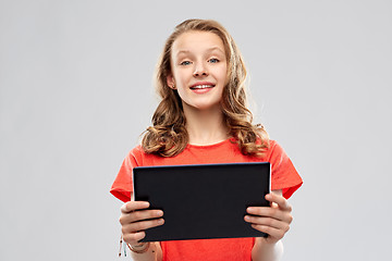 Image showing smiling teenage girl with tablet computer
