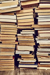 Image showing Wall of books piled up