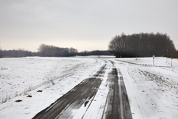 Image showing Rural road in snow in winter