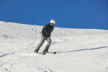 Image showing Skiing in the winter snowy slopes