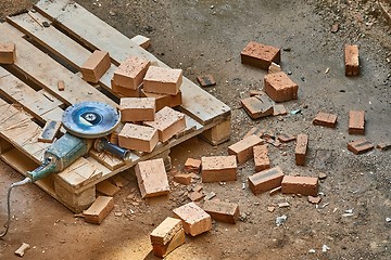 Image showing Brick House Construction, Cutting bricks