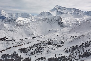 Image showing Skiing slopes, majestic Alpine landscape with trees