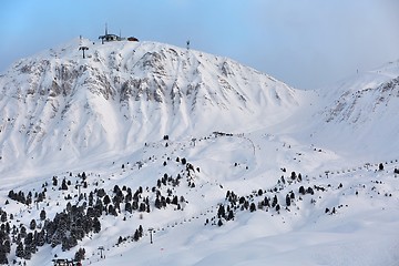 Image showing Skiing slopes, majestic Alpine landscape with snow and mountain range