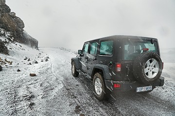 Image showing Jeep Wrangler on Icelandic terrain with snow