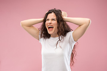 Image showing Beautiful woman looking bewildered isolated on pink