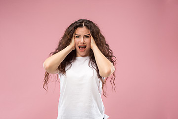 Image showing Beautiful woman looking bewildered isolated on pink