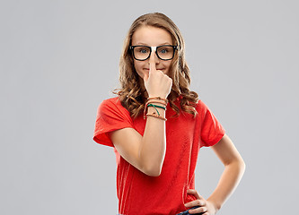 Image showing smiling student girl in glasses and red t-shirt