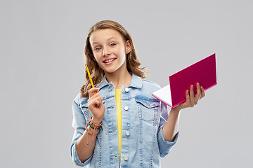 Image showing teenage student girl with diary or notebook