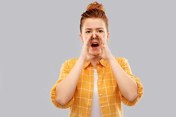 Image showing red haired teenage girl calling someone