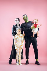 Image showing Halloween Family. Happy Father, Mother and Children Girls in Halloween Costume and Makeup