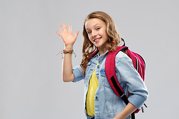 Image showing happy smiling teenage student girl with school bag