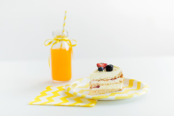 Image showing piece of berry layer cake on disposable plate