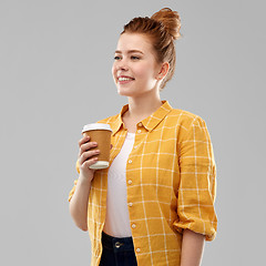 Image showing happy redhead teenage girl with paper coffee cup