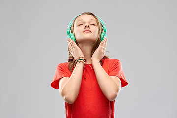 Image showing happy teenage girl with headphones