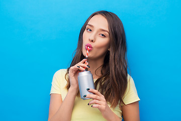 Image showing young woman or teenage girl drinking soda from can