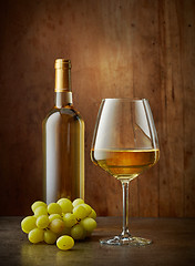 Image showing glass and bottle of white wine