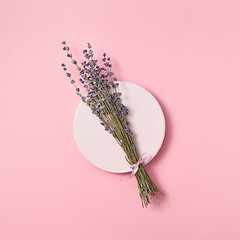 Image showing Organic lavender branch on a ceramic plate.