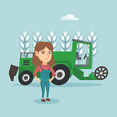 Image showing Farmer standing on the background of combine.