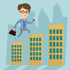 Image showing Business woman walking on the roofs of buildings.