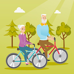 Image showing Happy senior couple riding on bicycles in park.