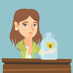 Image showing Caucasian broke woman looking at empty money box.