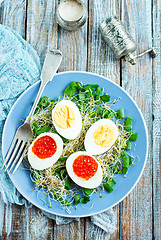 Image showing eggs with red salmon caviar