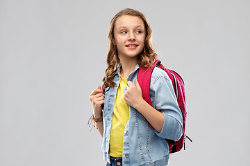 Image showing happy smiling teenage student girl with school bag