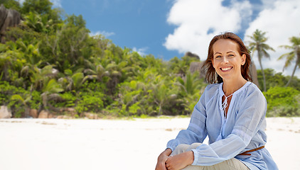 Image showing happy woman over seychelles island tropical beach