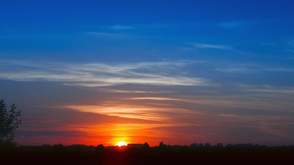 Image showing Glowing Golden Sunset Sky Background