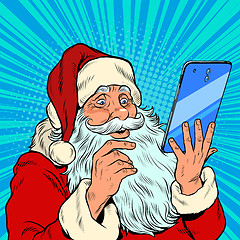 Image showing Santa Claus and a big smartphone. Electronic Christmas sales and orders in online stores