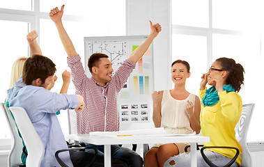 Image showing happy creative team or designers at office