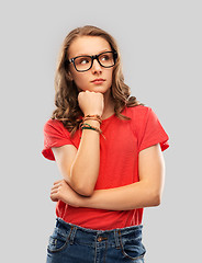 Image showing student girl in glasses thinking