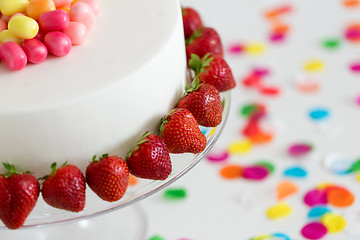 Image showing close up of birthday cake with strawberries