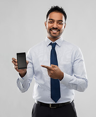 Image showing indian businessman with smartphone