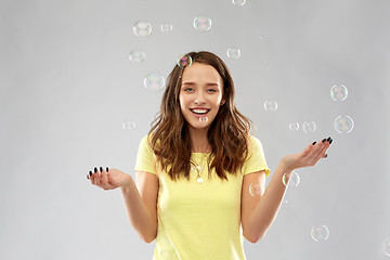 Image showing young woman or teenage gir with soap bubbles