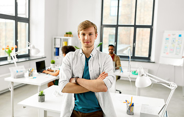 Image showing man with crossed hands at office