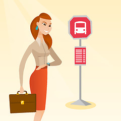 Image showing Caucasian woman waiting for a bus at the bus stop.