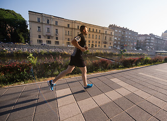 Image showing man jogging at sunny morning