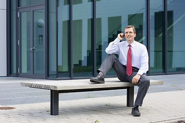 Image showing Businessman making a phone call